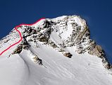 
Climb through the rock band (6960m) using fixed ropes and then along the summit ridge to the Lhapa Ri summit (7001m)
